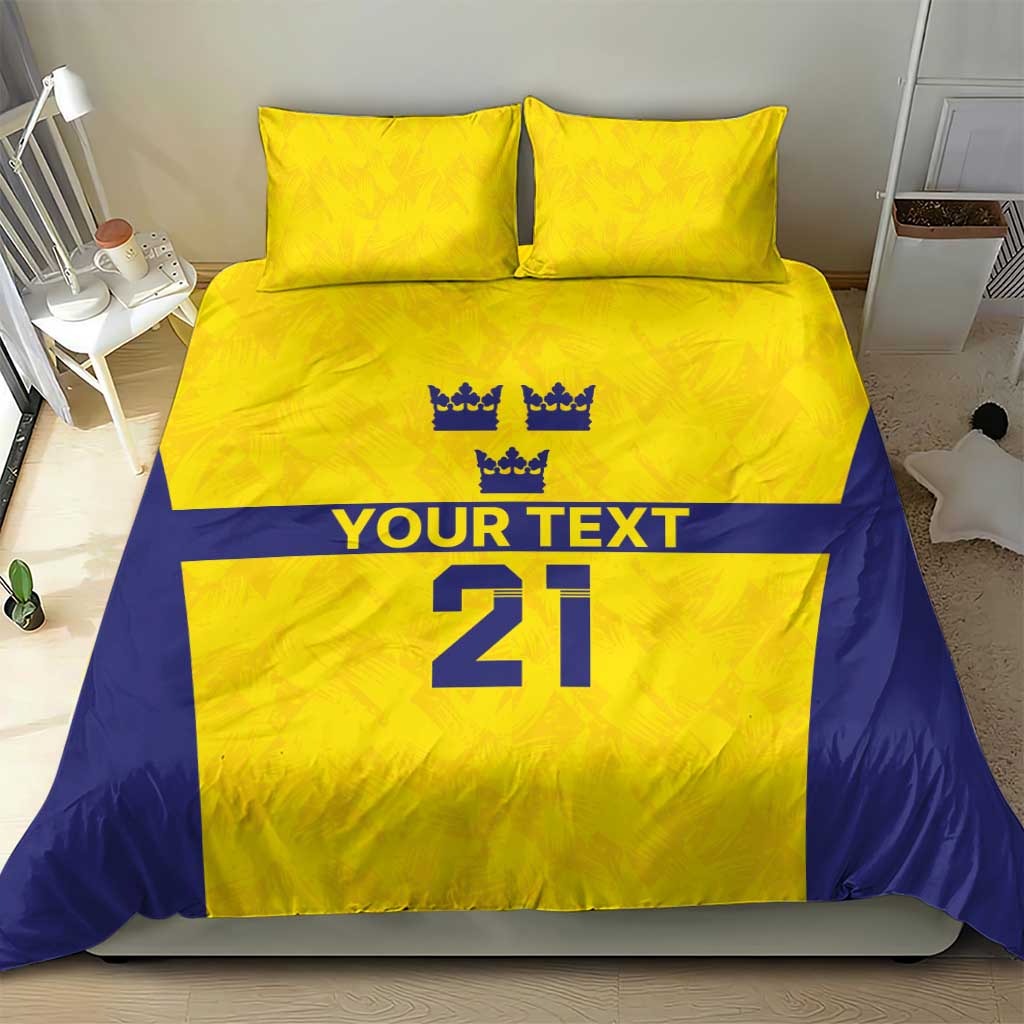 Gold and blue duvet cover set with 2 pillowcases; crowns above 'YOUR TEXT' and '21'.
