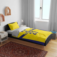 Gold and blue duvet cover with 1 matching pillowcase; crowns, 'YOUR TEXT', '21'.
