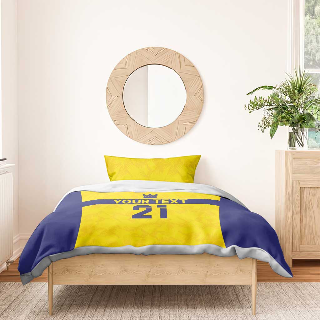 Gold and blue duvet with 1 pillowcase; crown marks above 'YOUR TEXT' and '21'.
