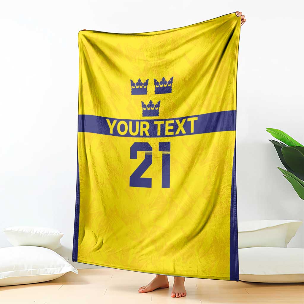 Gold rugby blanket shown hanging, navy border, crown icons, 'YOUR TEXT' and big '21'