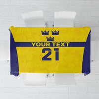 Gold and navy tablecloth with Swedish crowns, custom text and '21' centered