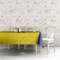 Gold and navy Swedish crown tablecloth on dining table with chairs