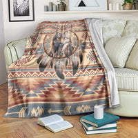 Tribal-inspired throw blanket with a central wolf dreamcatcher graphic and geometric border