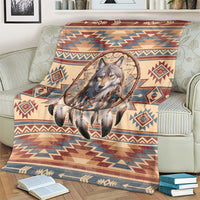 Geometric tribal throw blanket featuring a wolf inside a dreamcatcher circle