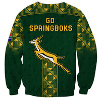 Green unisex rugby sweatshirt with Go Springboks text and springbok graphic, patterned back