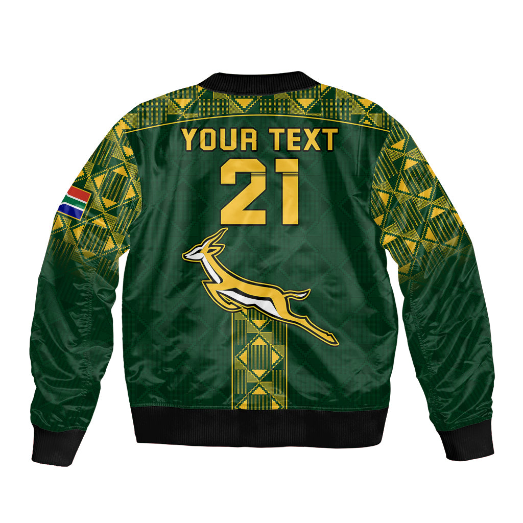 Green unisex bomber jacket back with large 21 print, springbok logo and geometric trim