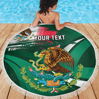 Green round beach blanket with white fringe, eagle emblem and 'YOUR TEXT' on display