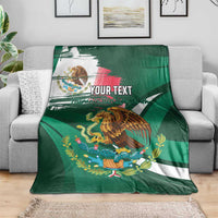 Personalized green eagle blanket draped on sofa, Mexican tricolor band and 'YOUR TEXT'.