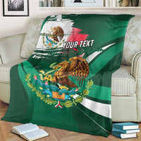 Personalized green blanket on couch with eagle emblem, tricolor stripe and 'YOUR TEXT'.
