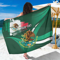 Green Mexican heritage sarong, draped, with eagle emblem and 'Your Text' panel