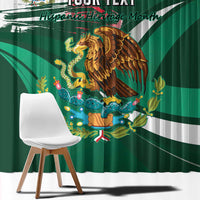 Green window curtain with large Mexican eagle print and top text band