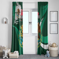 Green window curtains with Mexican eagle artwork and white stripe accents