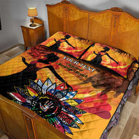 Gold quilt bed set with two pillows; dancer silhouettes and star floral artwork