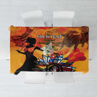 Personalized rectangular tablecloth in gold with colorful Hispanic-themed printed artwork