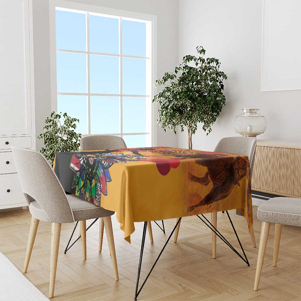 Gold tablecloth with colorful Hispanic graphic print on dining table