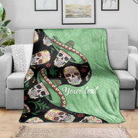 Green sugar skull throw blanket with black side and white 'Your text' imprint.