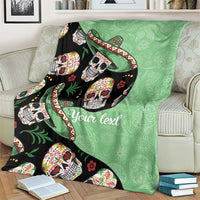 Green sugar skull blanket with sombrero, floral accents, and white 'Your text' print.