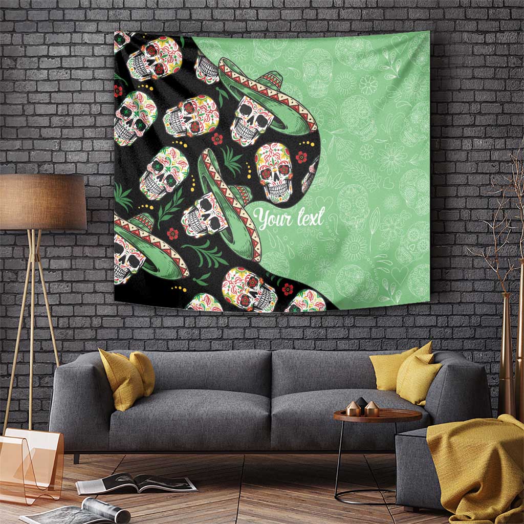 Wall-hung tapestry with green background, black border, and colorful sugar skulls