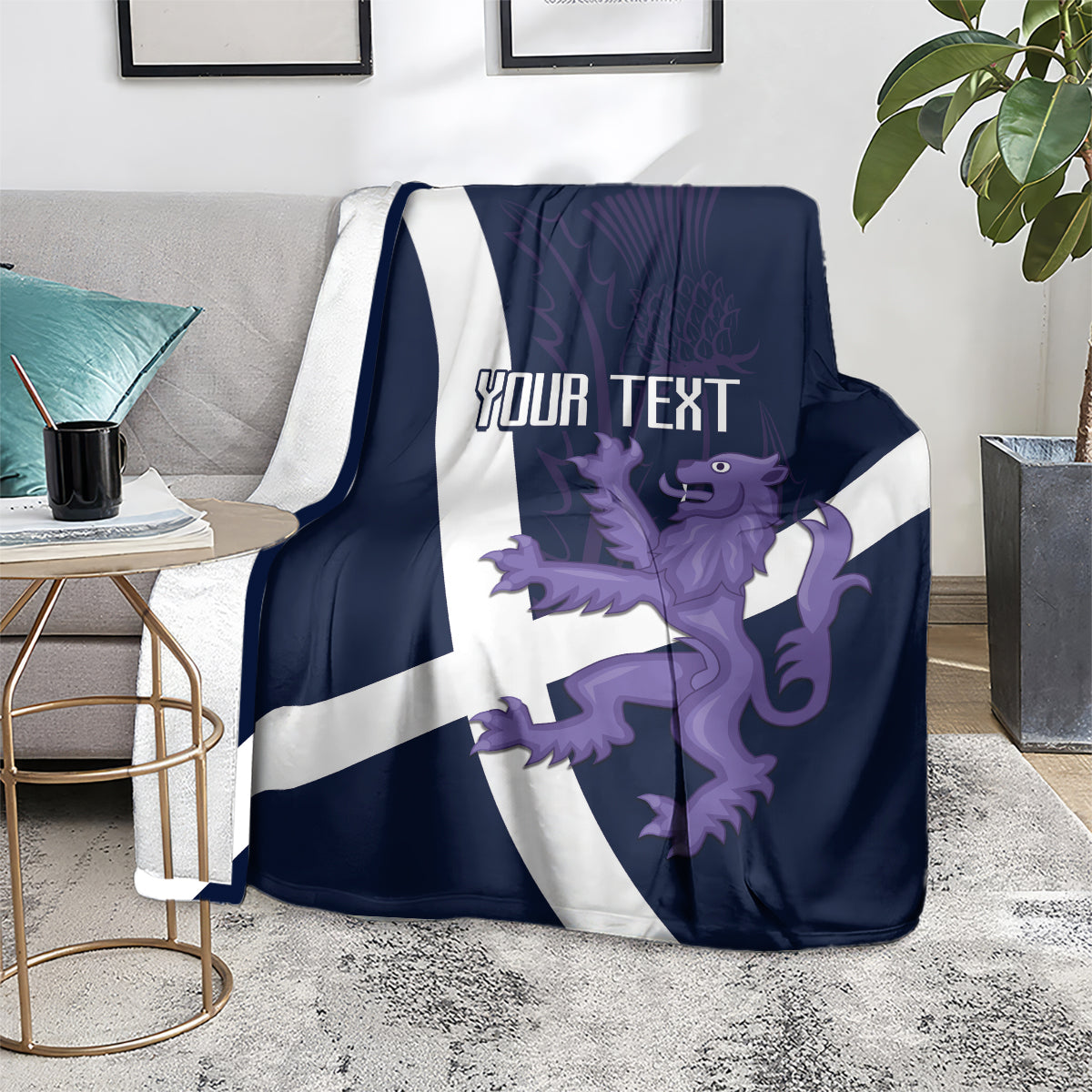 Draped navy rugby blanket with white cross, purple lion graphic and customizable text