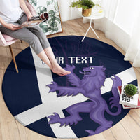 Navy round rug with white Scottish cross and purple lion graphic, partial 'YOUR TEXT'