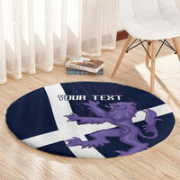 Navy round rug with purple lion and white cross pattern, 'YOUR TEXT' near upper edge