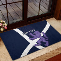 Navy rugby-style doormat featuring white cross and purple lion graphic at doorway
