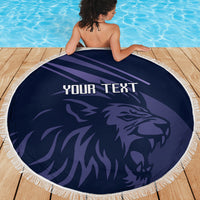 Navy round beach blanket with fringe edge, lion graphic and 'YOUR TEXT' text