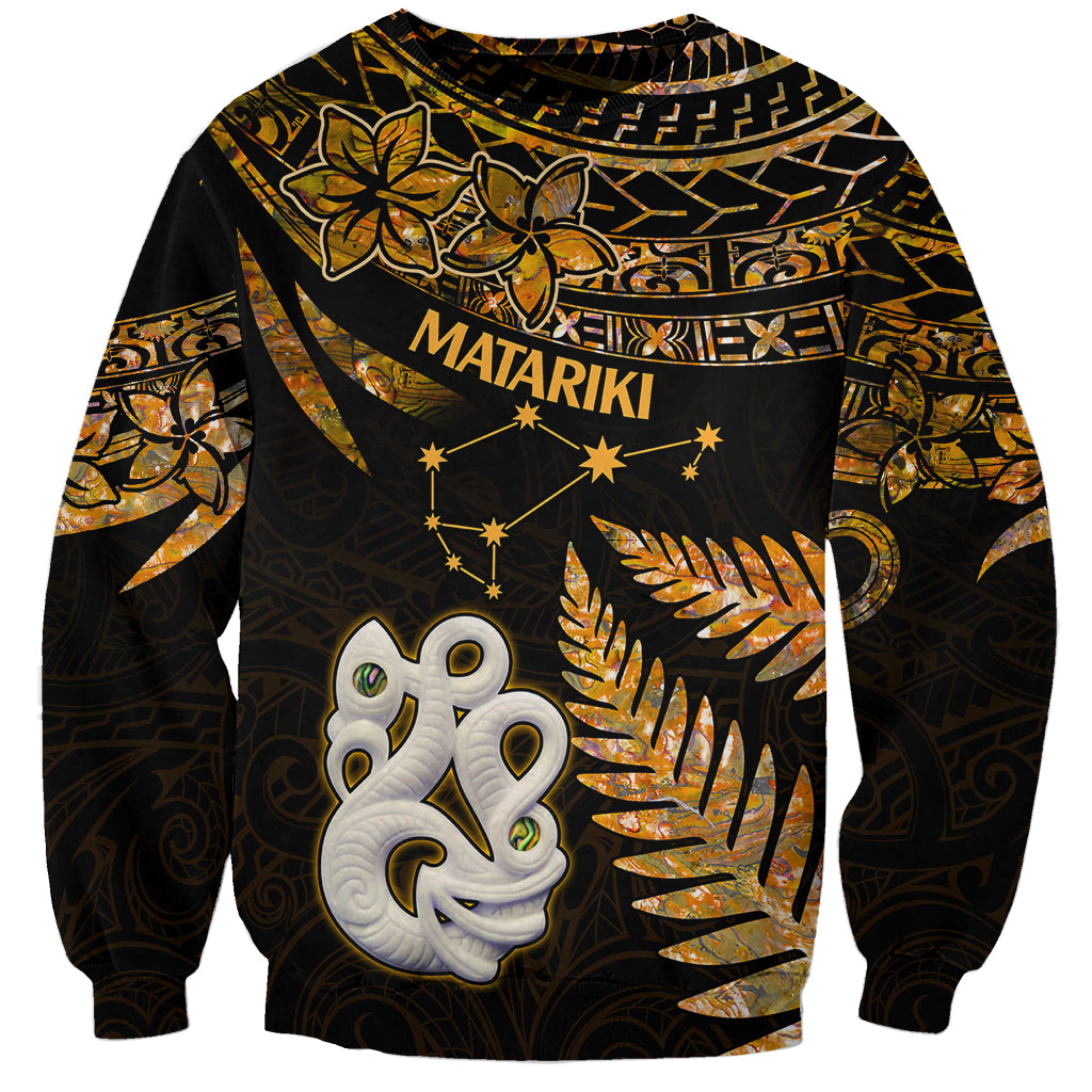 Unisex gold and black Maori sweatshirt with Matariki stars and manaia face graphic