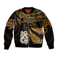Unisex bomber jacket with gold tribal patterns, black satin look, front zipper, ribbed cuffs