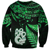Unisex green and black sweatshirt with Maori pattern, manaia face, fern and star motifs