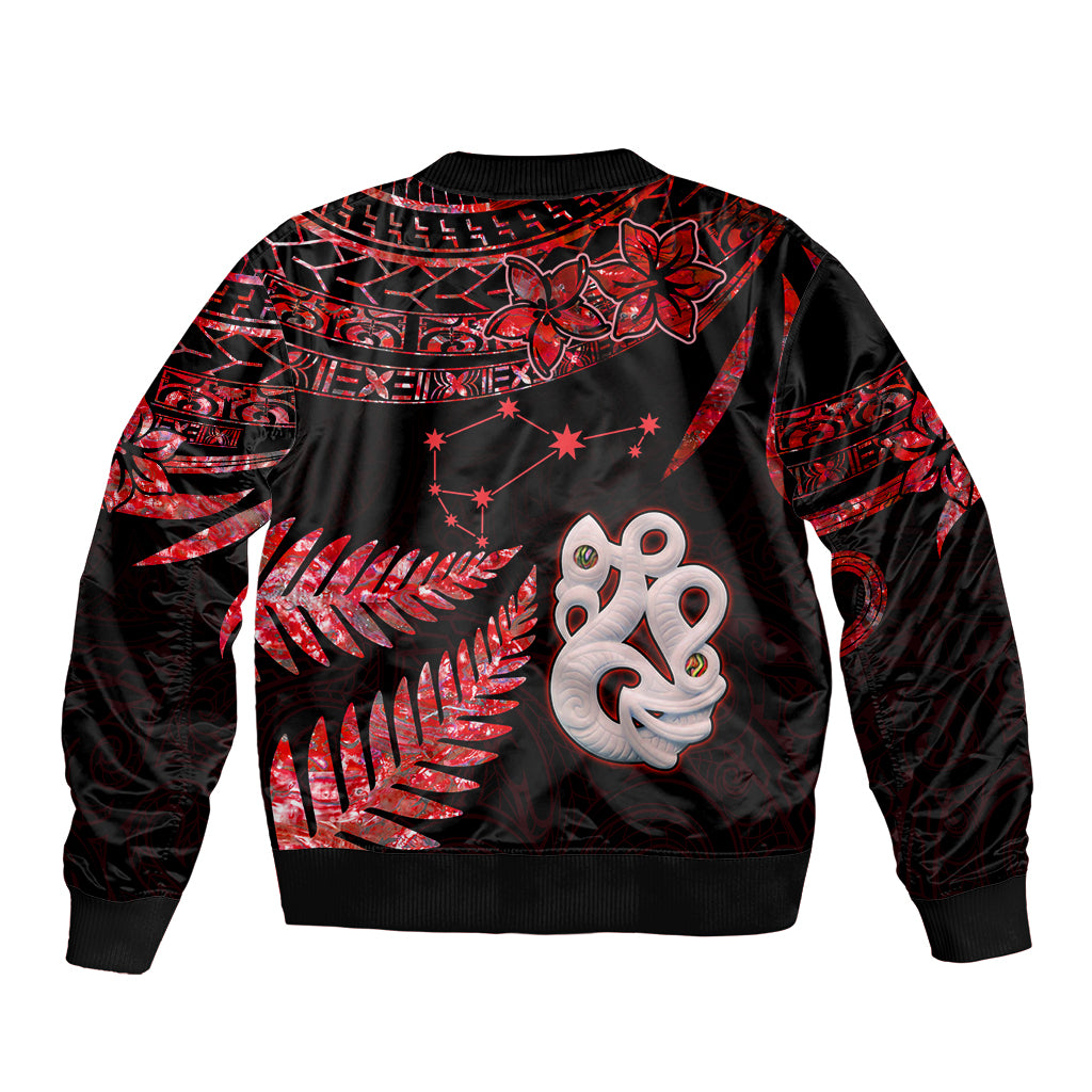 Unisex red-and-black bomber jacket back, red fern-and-manaia graphic, ribbed hem
