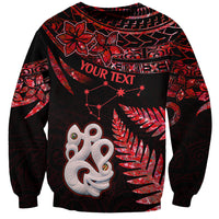 Unisex red and black sweatshirt with white manaia face and red star sparkle print