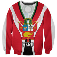 Red crewneck sweatshirt with striped V-trim and front graphic reading “PERU”.