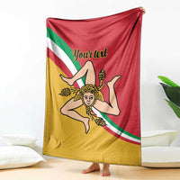 Personalized Sicilian flag blanket draped over floor, woman emblem with red and yellow stripes