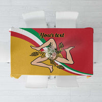 Red tablecloth with yellow border and Sicilian flag-style emblem and custom text
