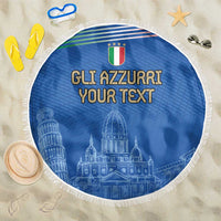 Round blue Italy beach blanket with fringed edge, football crest and 'GLI AZZURRI' text.
