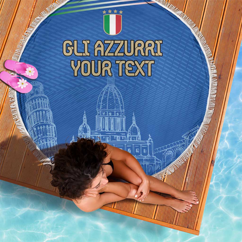Round blue beach blanket with fringed edge on striped mat, 'GLI AZZURRI YOUR TEXT' graphic.