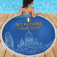 Round blue Italy beach blanket with fringed edge, 'GLI AZZURRI YOUR TEXT' and landmark skyline.