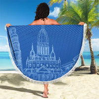 Round blue beach blanket with fringed edge showing Italy crest and 'GLI AZZURRI' text, held up.