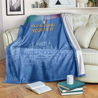 Blue football blanket draped on bed with Italy crest, 'GLI AZZURRI YOUR TEXT' skyline art