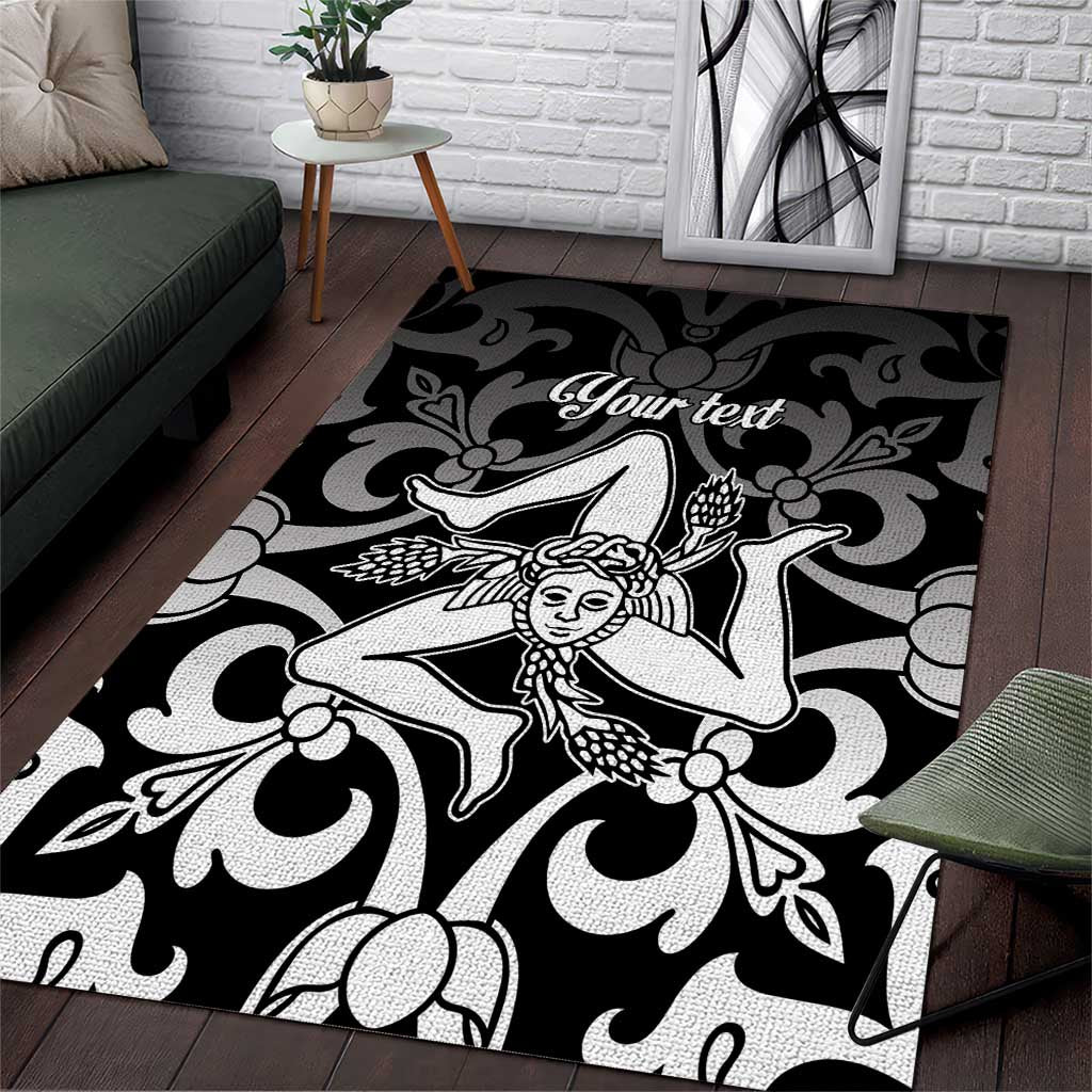 Black rectangular area rug with close view white face medallion and 'Your text' script