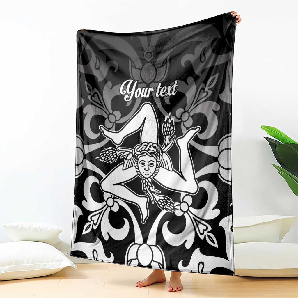 Personalized Sicily blanket draped vertically, black-and-white Trinacria design with “Your text”