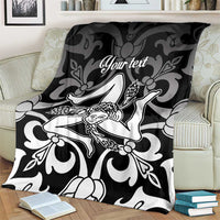 Personalized Sicily blanket on couch backrest, black-and-white Trinacria design and “Your text”
