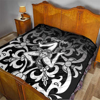Black quilt blanket on bed with gray ornamental pattern and central woman graphic, 'Your text'.