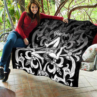 Black quilt blanket with bold gray scrolls and central Trinacria-style woman, 'Your text'.