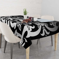 Black and white abstract floral tablecloth on a dining table