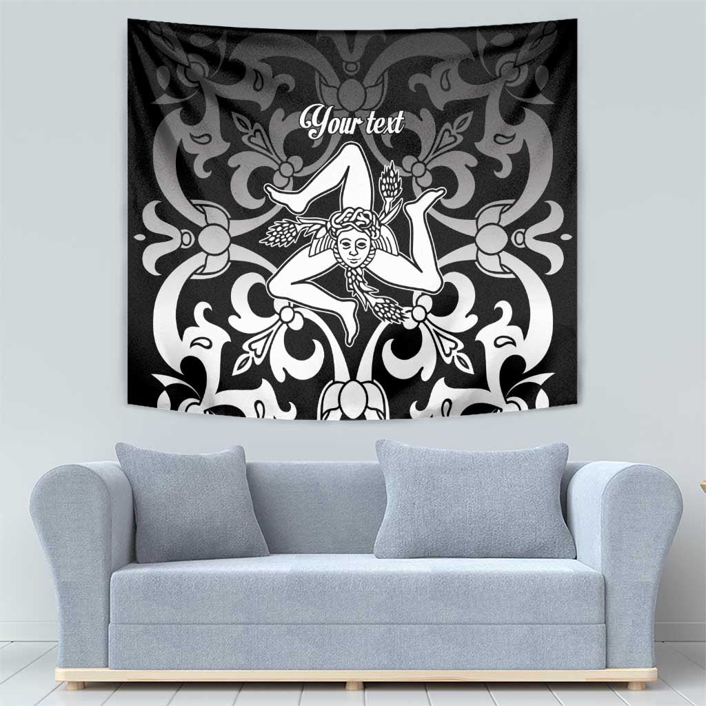 Black and white tapestry with central woman figure and ornate baroque swirl design
