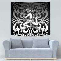 Black and white tapestry with central woman figure and ornate baroque swirl design