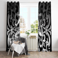 Black and white ornamental window curtain panels with central decorative design