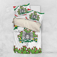 White bedding set laid flat with green cactus, yellow lemons, and central triskelion face